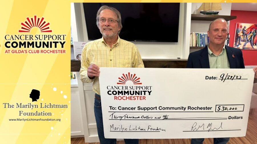 Logo and text Cancer support Community at Gilda’s Club Rochester and The Marilyn Lichtman Foundation www.MarilynLichtmanFoundation.org, photo of two people holding an oversized check.