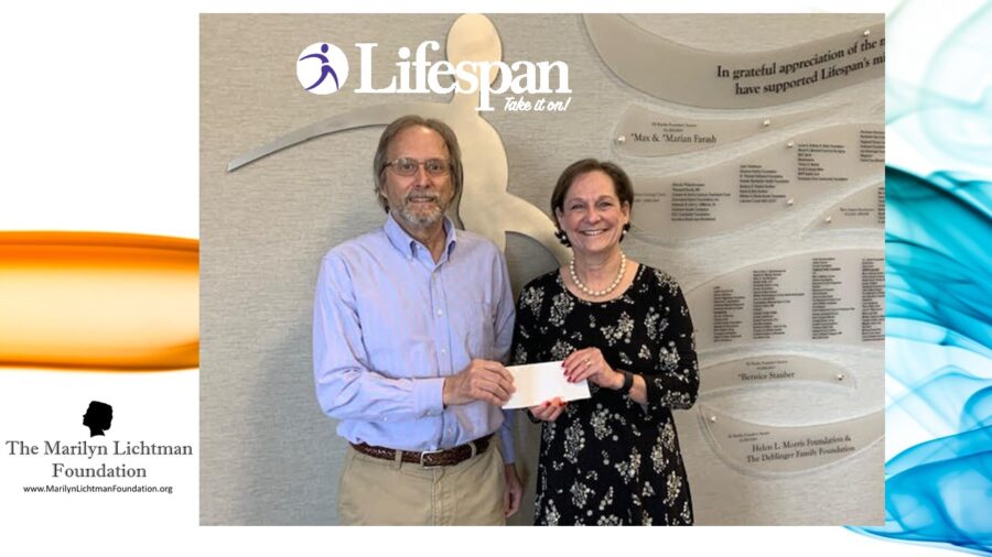 Image of two people holding a check, logo of Lifespan with text saying take it on. Logo of the Marilyn Lichtman Foundation www.MarilynLichtmanFoundation.org