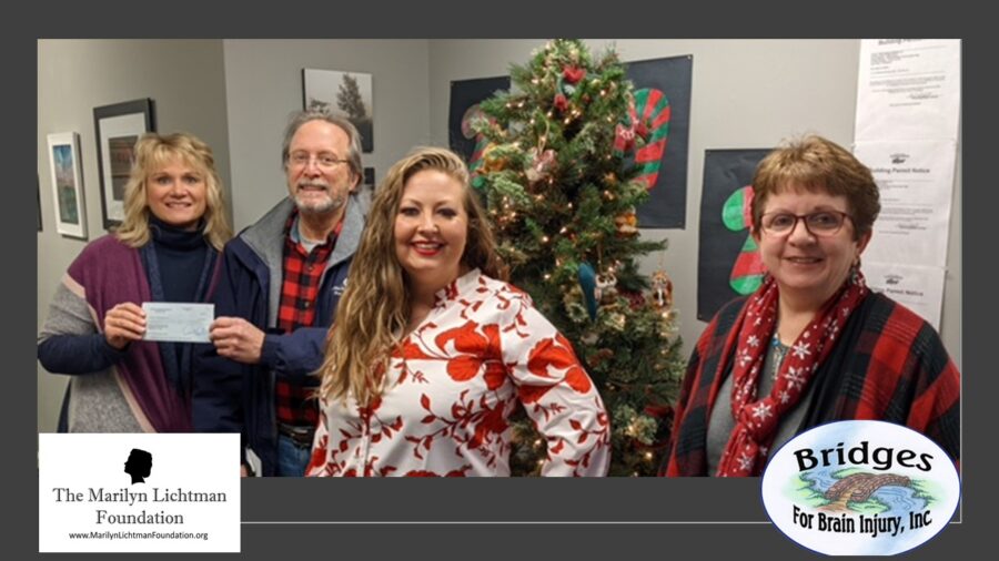 Photos of four people standing by a Christmas tree, logos of The Marilyn Lichtman Foundation, www.MarilynLichtmanFoundation.com and Bridges for Brain Injury, Inc.